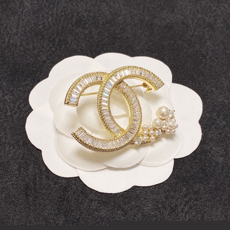 Ch*el brooches